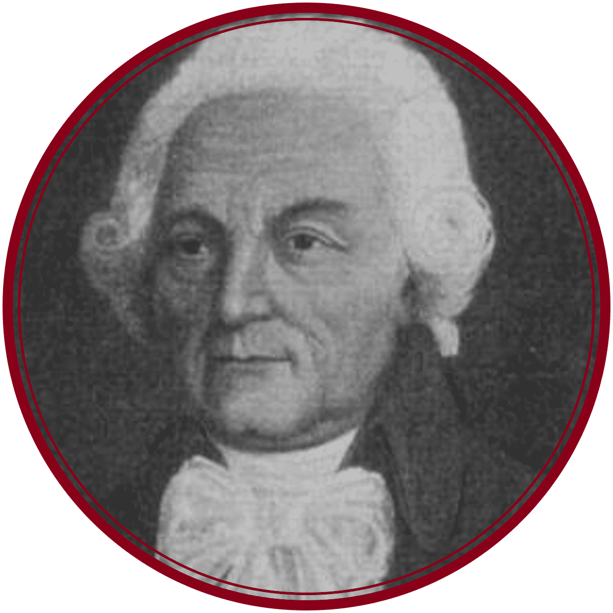Schwarz-Weiß-Porträt eines älteren Mannes mit weißem, gelocktem Haar, der eine dunkle Jacke und eine Krawatte trägt. Das Bild wird von einem roten, kreisförmigen Rand umrahmt.